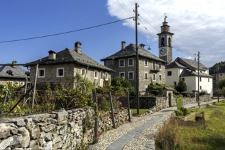 View of the village, typical Ticino stone houses in the mountain village of Rasa, Centovalli,