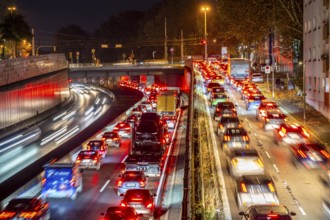 Evening traffic, partly with congestion, slow-moving traffic on the A40 motorway, traffic jam