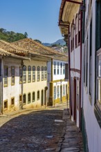 Street surrounded by old colonial houses in the historic city of Ouro Preto in Minas Gerais, Ouro