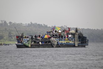 Overloaded ferry on the Congo River, near Tshumbiri, Mai-Ndombe Province, Democratic Republic of