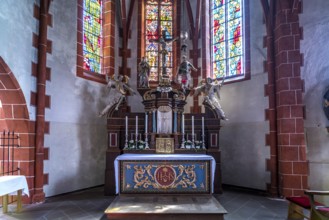 Altar in the interior of the Catholic parish church of St Martin in the Ediger district,