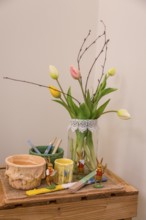 Easter still life with bouquet of tulips, colour pots and Easter bunny in the Wendt & Kühn world in