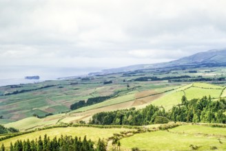 Coastal landscape with the island of Ilhéu de Vila Franca do Campo, São Miguel Island, Azores,