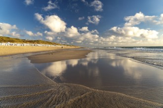 Clouds reflected in the water on the west beach near Westerland, island of Sylt, district of North