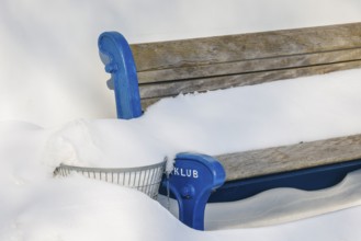 Hamm, North Rhine-Westphalia, Germany - Ice and snow on the river Lippe, bench with snow, rowing