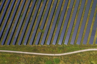 Dortmund, North Rhine-Westphalia, Germany, Deusenberg solar park. The ground-mounted system is