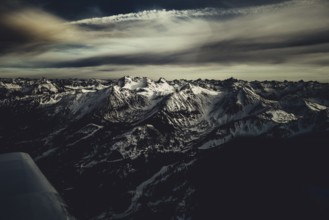 Flight over the late winter Lech Valley with a small aeroplane in Tyrol, Austria, Europe