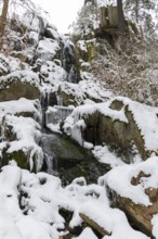 Blauenthal waterfall in the snow, partly iced over, Eibenstock, Erzgebirge, Saxony, Germany, Europe