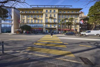 Hotel Walter Au Lac, pedestrian crossing, building, trees, pedestrians as accessories, street Riva