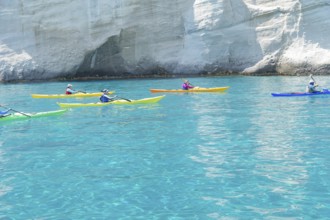 Group of people Kayaking, Kleftiko, Milos Island, Cyclades Islands, Greece, Europe