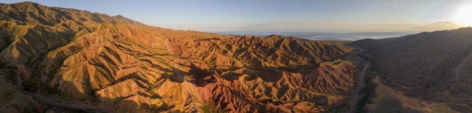 Aerial view, eroded mountain landscape, sandstone cliffs, canyon with red and orange rock