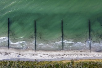 Aerial view over wooden groynes protection shoreline near Wustrow on the Fischland peninsula along