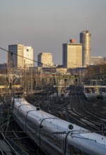 ICE train on the tracks west of Essen central station, skyline of the city centre, North