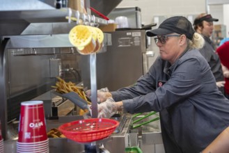 Romulus, Michigan USA, 27 August 2024, Workers filled fast food orders as Sheetz opened its first