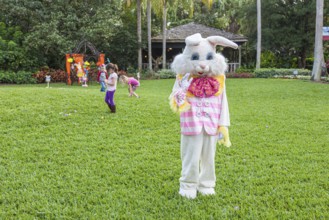 Easter Bunny character hosts egg hunt for children at Busch Gardens in Tampa, Florida, USA, North