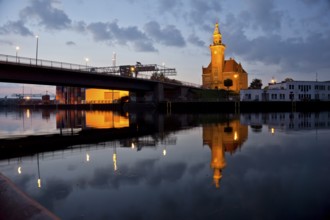 The old harbour office in the neo-renaissance style in the harbour in Dortmund at dusk, North