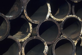 Metal rusty pipeline tubes stocked at industry yard