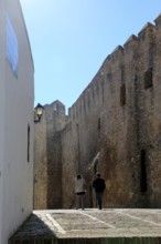 Historic street and castle walls in the village of Vejer de la Frontera, Cadiz Province, Spain,