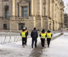 Group of police officers with yellow high-visibility waistcoat, Reichstag, Berlin, Germany, Europe