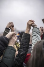 150, 000 people gather around the Bundestag in Berlin to build a human wall against the shift to