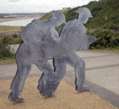 Figures of soldiers carrying ammunition, Newhaven Fort, East Sussex, England, United Kingdom,