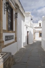 Old town alley in Lindos, Rhodes, Dodecanese archipelago, Greek islands, Greece, Europe