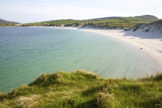 Sandy beach and aquamarine sea at Vatersay Bay, Barra, Outer Hebrides, Scotland, UK