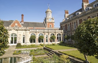 The White Garden and clock tower at Somerleyton Hall country house, near Lowestoft, Suffolk,