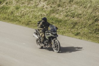 A soldier on a BMW F 850 GS, photographed as part of a Bundeswehr exercise with armed forces from