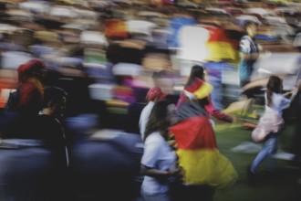 Fans react during the European Championship preliminary round match between Germany and Hungary on