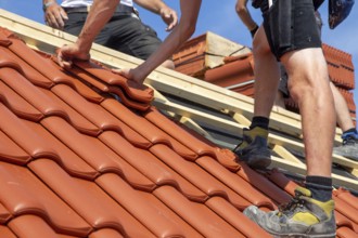 Roofing work, re-roofing of a tiled roof