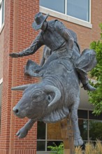 Pueblo, Colorado, A statue of a bull rider outside the headquarters of Professional Bull Riders