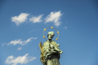 Statue of St John of Nepomuk, Charles Bridge on the Vltava River, UNESCO World Heritage Site,