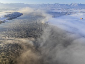 Aerial view of a lake in front of mountains, winter, snow, morning light, fog, Riegsee, Alpine