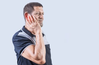 Senior man suffering from ear pain isolated. Person with otitis and tinnitus. Senior people with