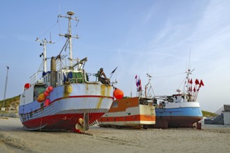 Fishing boats on a sandy beach under a bright sky, Lokkken, North Jutland, Denmark, Europe