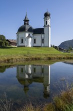 Seekirchl mi reflection, Heiligkreuzkirche, Seefeld, Tyrol, Austria, Europe