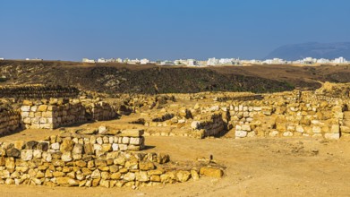 Ancient archaeological site of Sumhuram, near the city of Taqah, behind the modern houses of Taqah,