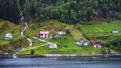 Mountains and Fiord over Norwegian Village in Olden, Innvikfjorden, Norway, Europe