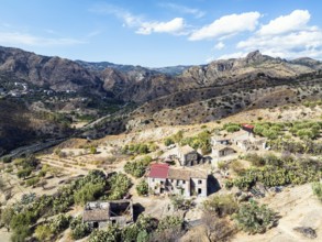 Mountains and Olive groves around Ghost Town from a drone, Pentedattilo Village, Calabria, Italy,