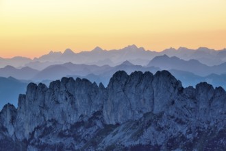 Fribourg Prealps with Gastlosen mountain range at dawn, Bernese Alps behind, cantons of Fribourg