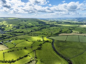 Farms and Fields over Cononley and River Aire from a drone, Keighley, North Yorkshire, England,