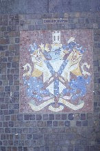 Colourful city coat of arms of the English twin town Christchurch in England, floor mosaic, lion