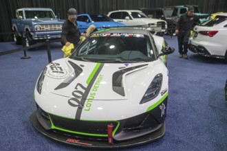 Detroit, Michigan USA - 10 January 2025 - A Lotus among luxury cars on display at The Gallery, a