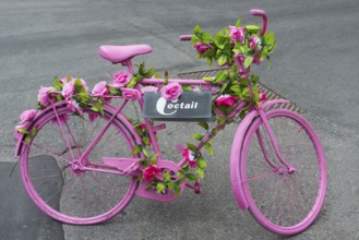 Flower-decorated pink bicycle, bike, pink, decorated, flowers, hippie, mobile, mobility, painted,