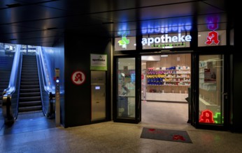 Night shot, pharmacy city centre, logo, subway, escalator, neon light, illuminated, Stuttgart,