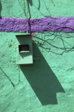 Colourful house wall, turquoise and purple, electrical wiring, Ethiopia, Africa