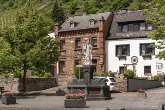 Lindenplatz and statue of St Castor in Karden, Treis-Karden, Rhineland-Palatinate, Germany, Europe