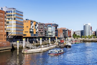 Building in the HafenCity Sandtorhafen harbour with boats in Hamburg, Germany, Europe