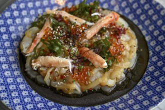 Jellyfish salad with taraba crab meat and oyster chilli sauce at Yào Restaurant, Hotel The